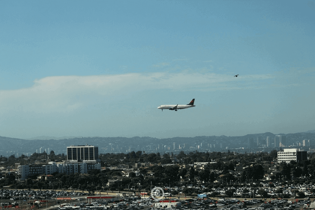 Aircraft descending gracefully, signifying momentum, precision, and the landing of breakthrough business success.