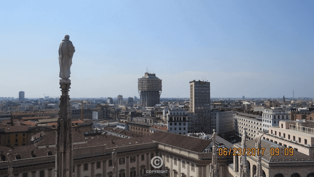 An entrepreneur overlooking the city from a skyscraper rooftop, embodying vision, strategic foresight, and limitless potential.