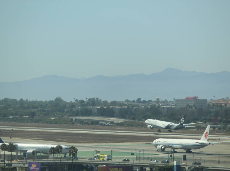 Aircraft landing and taxiing for takeoff—symbolizing SME legacy and scale readiness inspired by family-owned business strategy.