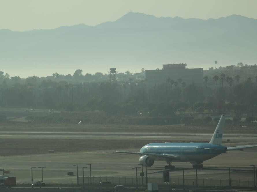 KLM plane on LAX runway at dusk representing SME leaders preparing for strategic takeoff and competitive advantage