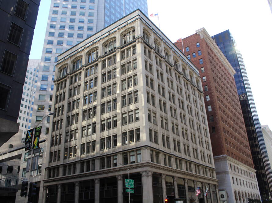 City building representing the momentum SMEs gain through agentic AI pricing and strategic market positioning.