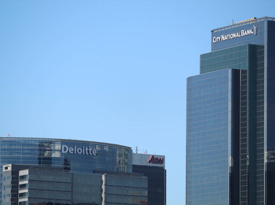 Hero image of Deloitte, Aon, and City National Bank towers symbolising Agentic AI disruption across retail and SME banking.